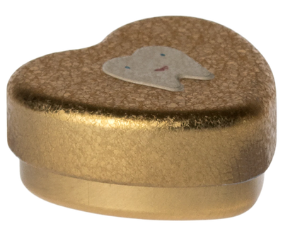 Sød æske i guldfarvet metal til de små mælketænder. På toppen af låget er der en sød tand.