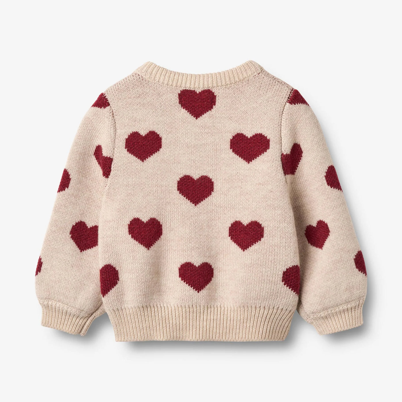 Jaquard Cardigan, Hearts, OffWhite, Merino Wool fra Wheat

Denne langærmede strikcardigan til børn er strikket i en dejlig blød uldkvalitet og har en behagelig, normal til let løs pasform. 