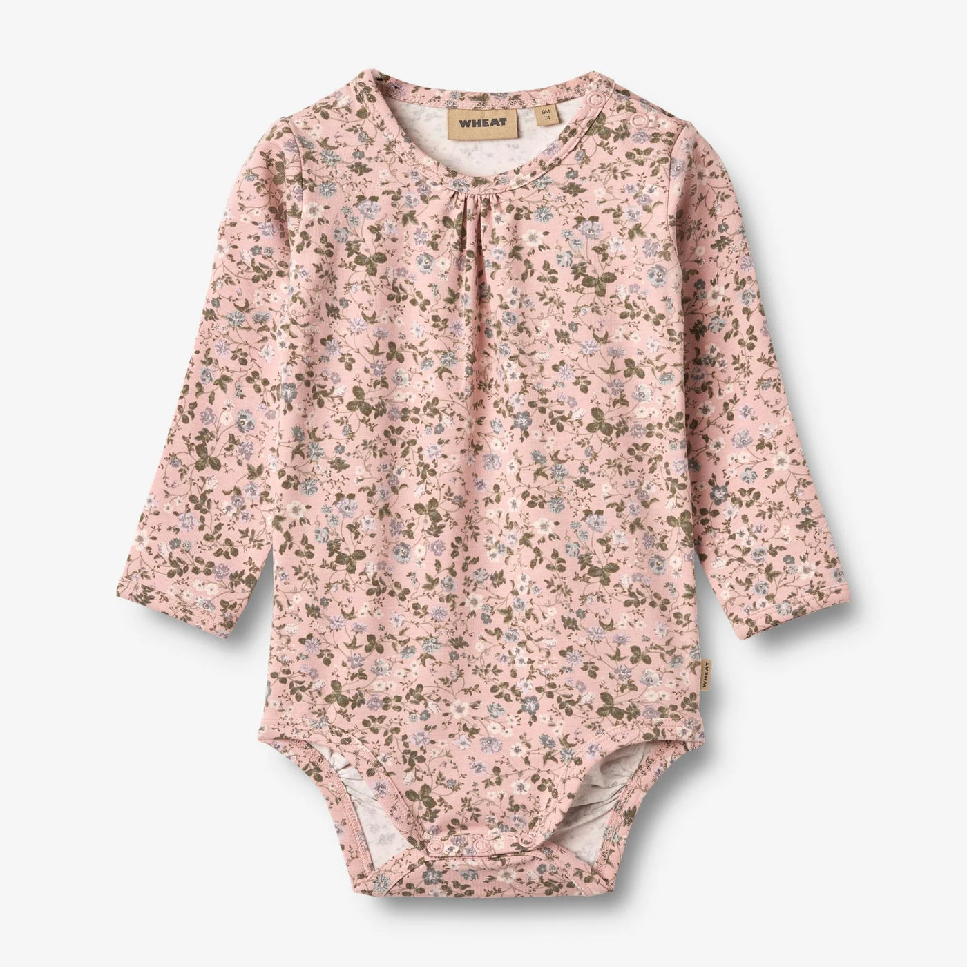 Body L/S Liv, Rose Powder Flowers fra Wheat

Langærmet body med sødt print af blomster i blød økologisk bomuldsjersey til din baby.