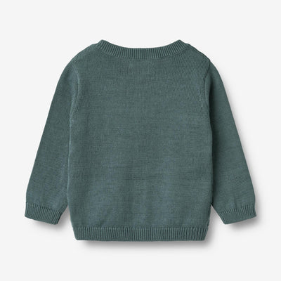 Strikket Cardigan, Bjørn, Stormy fra Wheat

Lækker langærmet strikcardigan i blød økologisk bomuld fra Wheat.