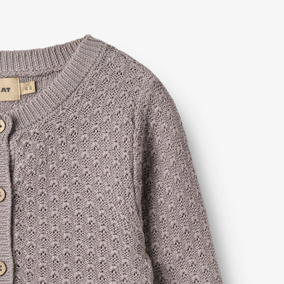 Strikket Cardigan, Magnella, Dusty Purple fra Wheat

Langærmet strikcardigan i blødt økologisk bomuld til børn.