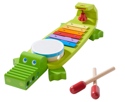 Spille krokodille musiklegetøj