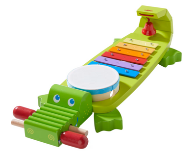 Spille krokodille musiklegetøj
